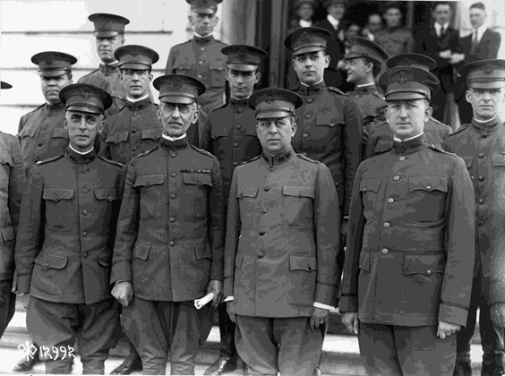 Major General Enoch Crowder (second from left, front), and officers who assisted with the second drawing of draft numbers, June 27, 1918. (Credit: National Archives and Records Administration)
